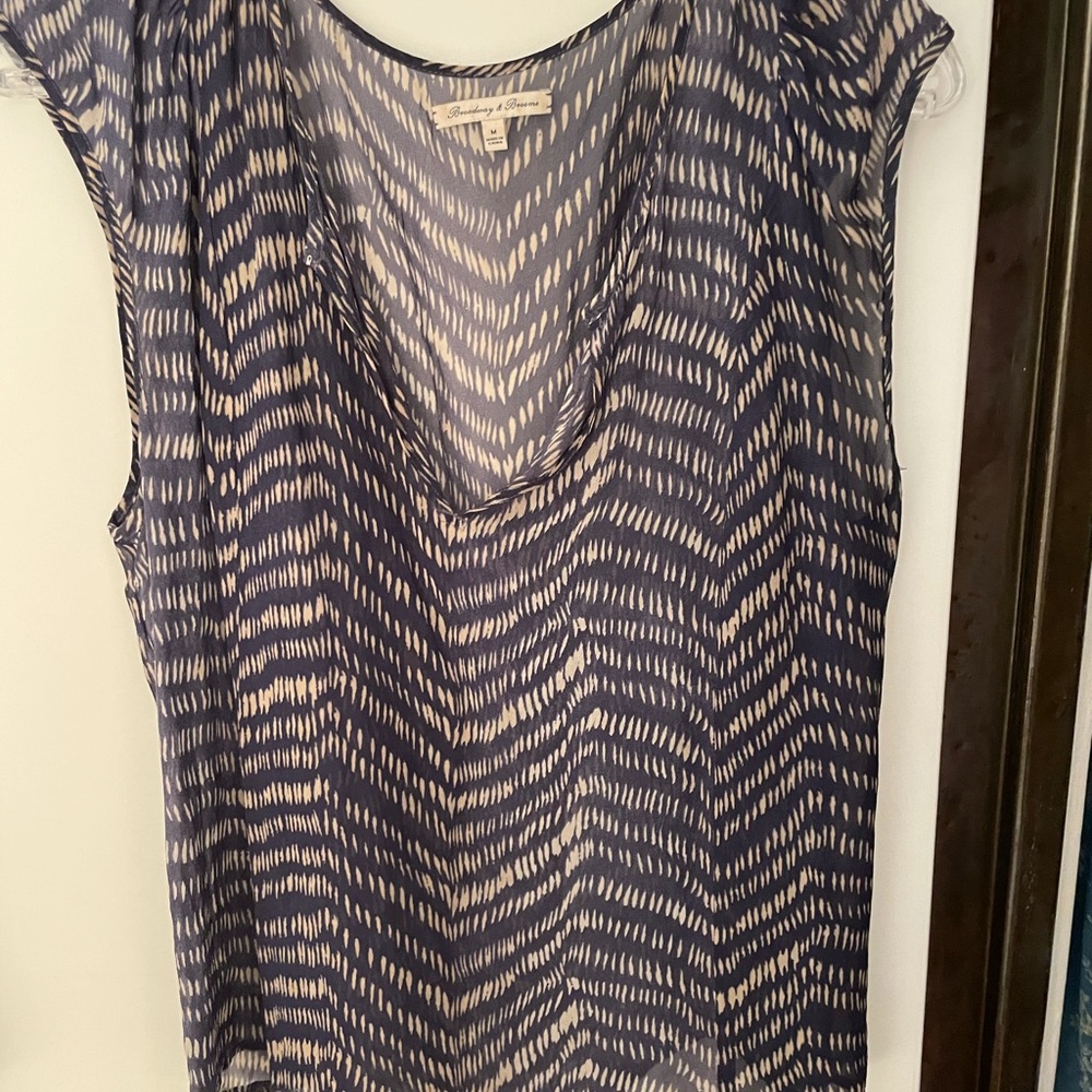 Sheer blue and white chevron sleeveless blouse